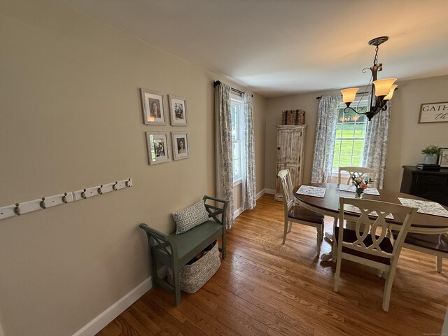 104 Wildcat Hill Rd, Harwinton, CT 06791 - dining space featuring a chandelier and light wood-style flooring