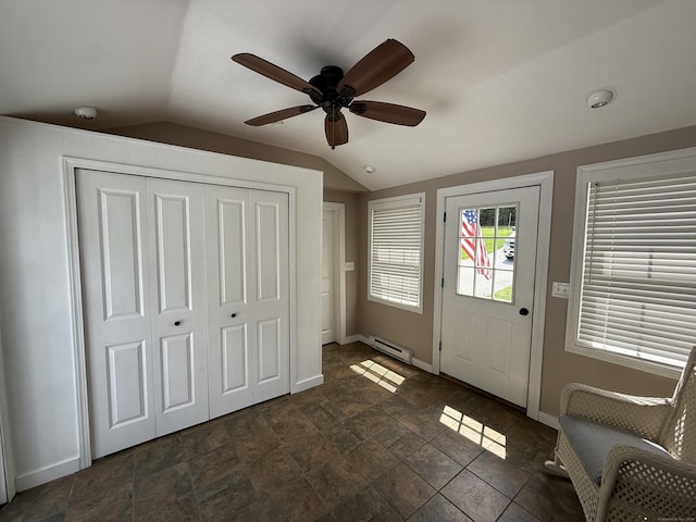 104 Wildcat Hill Rd, Harwinton, CT 06791 - entrance foyer with a baseboard radiator, vaulted ceiling, ceiling fan, and dark stone finish flooring