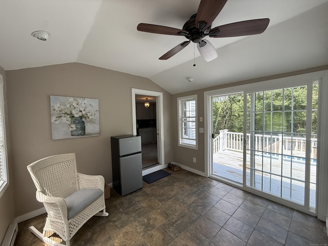 104 Wildcat Hill Rd, Harwinton, CT 06791 - living area with a baseboard radiator, lofted ceiling, ceiling fan, and dark stone finish flooring