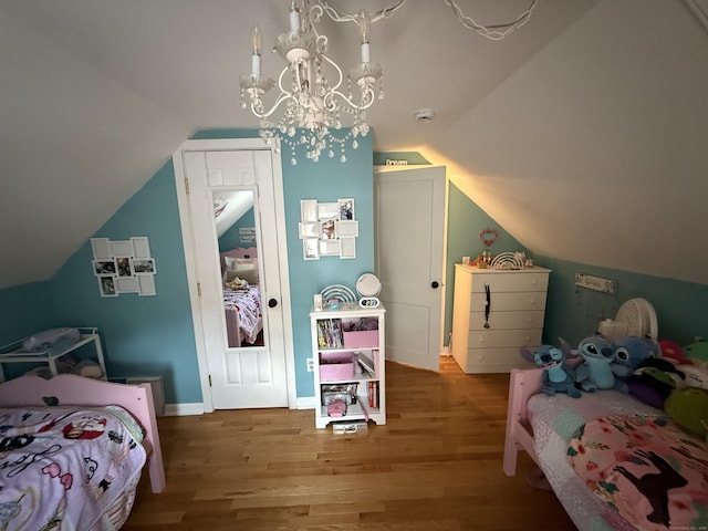 104 Wildcat Hill Rd, Harwinton, CT 06791 - bedroom featuring wood finished floors, vaulted ceiling, and a chandelier