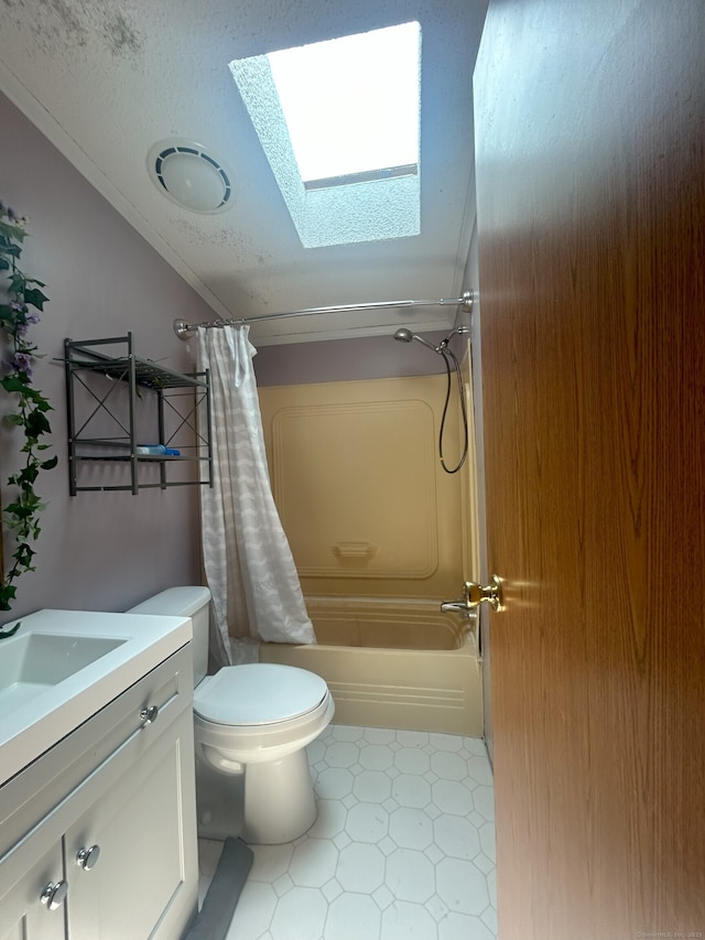 967 Long Cove Rd Trlr 2, Ledyard, CT 06335 - bathroom featuring a skylight, shower / bath combo, vanity, lofted ceiling, and tile patterned floors