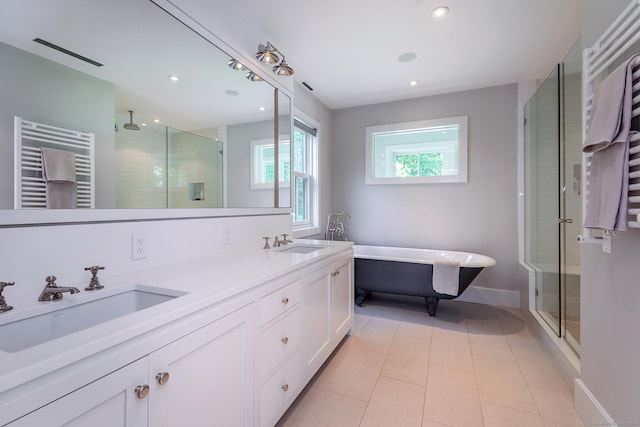 85 W Church Hill Rd, Washington, CT 06794 - bathroom with a shower stall, radiator heating unit, a towel warming rack, a soaking tub, and recessed lighting