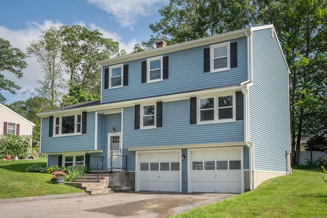 20 Birchwood Dr, Torrington, CT 06790 - raised ranch featuring a garage, a front lawn, a chimney, and driveway