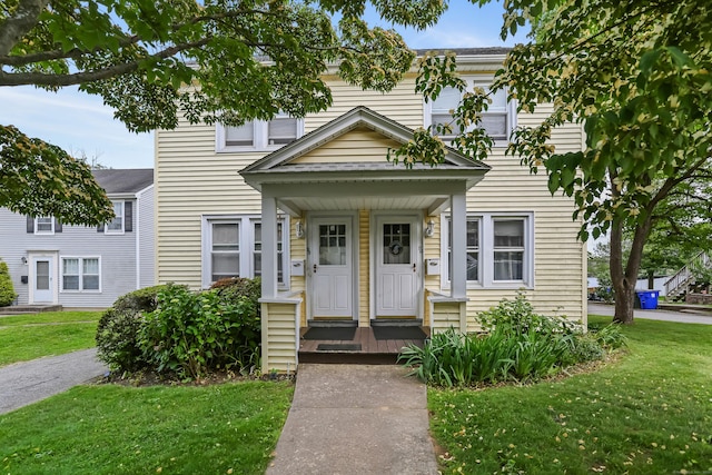 96 Kenwood Ave, Fairfield, CT 06824 - view of front of house featuring a front lawn