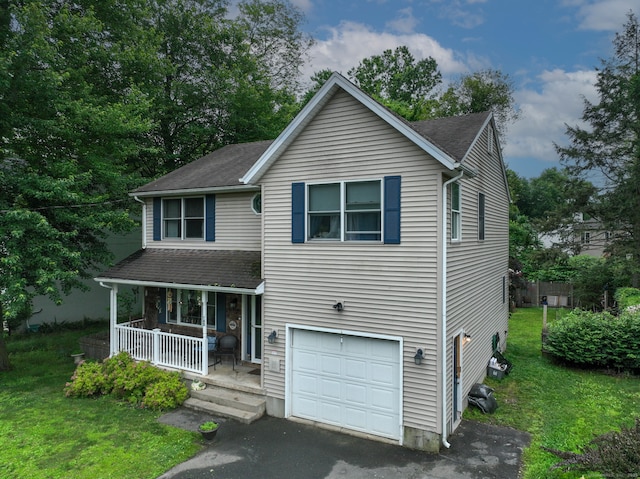 345 Goodwin St, East Hartford, CT 06108 - traditional-style home featuring a porch, roof with shingles, a garage, and a front yard