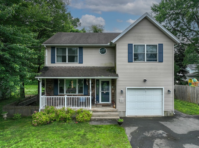 345 Goodwin St, East Hartford, CT 06108 - traditional-style house featuring a porch, a garage, asphalt driveway, and a shingled roof