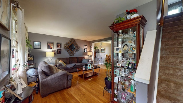 345 Goodwin St, East Hartford, CT 06108 - living area with stairway and wood finished floors