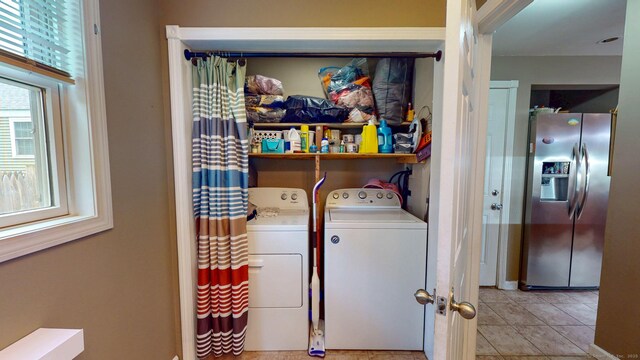 345 Goodwin St, East Hartford, CT 06108 - laundry room with separate washer and dryer and light tile patterned flooring