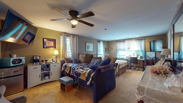 345 Goodwin St, East Hartford, CT 06108 - living area featuring light colored carpet, ceiling fan, and an office area