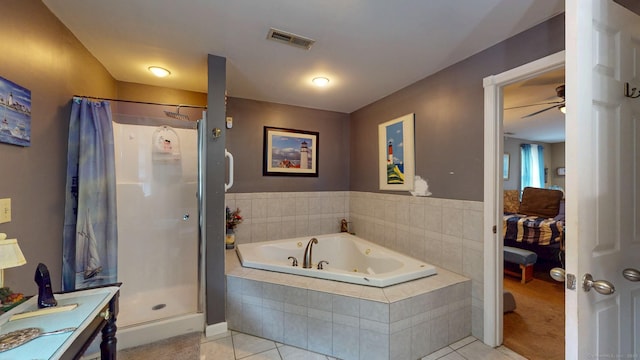 345 Goodwin St, East Hartford, CT 06108 - full bathroom with tile patterned flooring, connected bathroom, a bath, a stall shower, and vanity