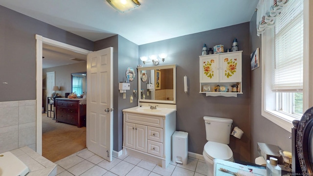 345 Goodwin St, East Hartford, CT 06108 - full bath with vanity and tile patterned floors