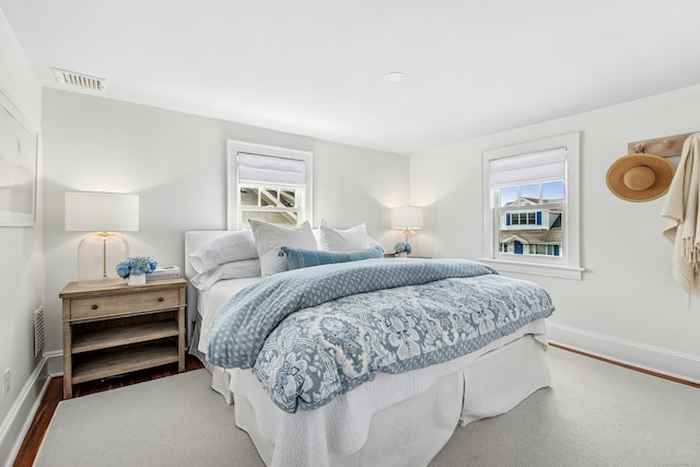 18 Wallace Ave, Norwalk, CT 06855 - bedroom featuring multiple windows and wood finished floors