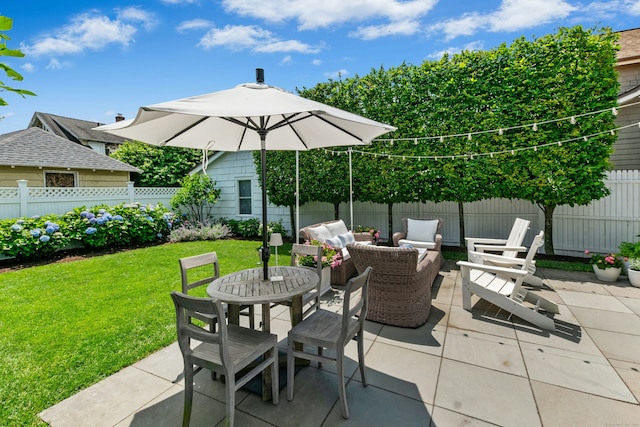 18 Wallace Ave, Norwalk, CT 06855 - fenced backyard featuring a patio and outdoor lounge area