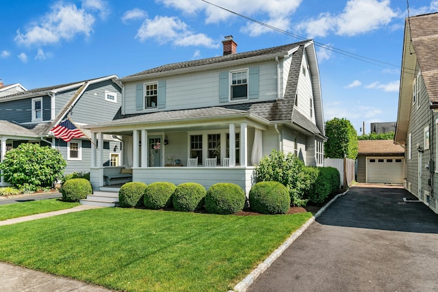 18 Wallace Ave, Norwalk, CT 06855 - dutch colonial with covered porch, driveway, a chimney, an outbuilding, and a front yard