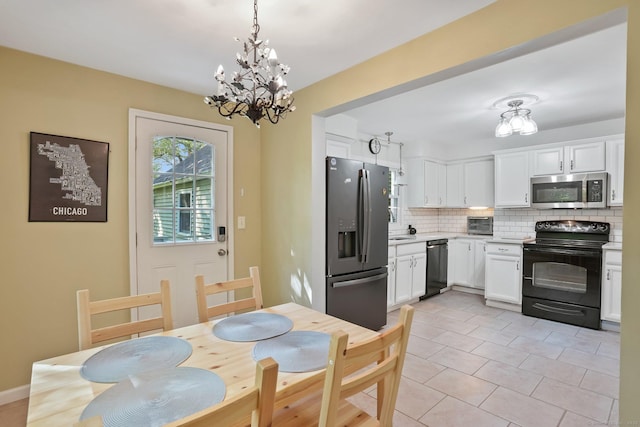 15 Granite Ter, Ansonia, CT 06401 - dining space featuring a chandelier and light tile patterned flooring