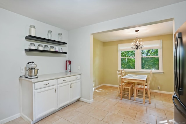 15 Granite Ter, Ansonia, CT 06401 - dining space featuring a chandelier and light tile patterned floors