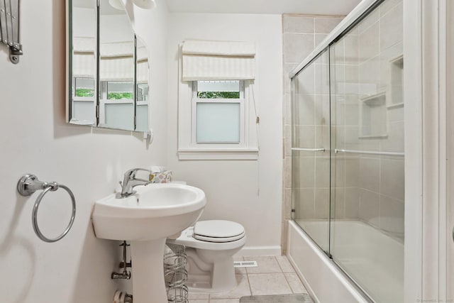 15 Granite Ter, Ansonia, CT 06401 - bathroom with tile patterned floors and bath / shower combo with glass door