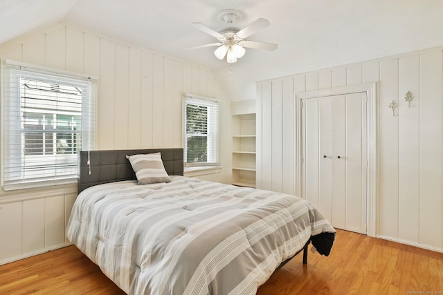 15 Granite Ter, Ansonia, CT 06401 - bedroom with vaulted ceiling, wood finished floors, a decorative wall, and a ceiling fan