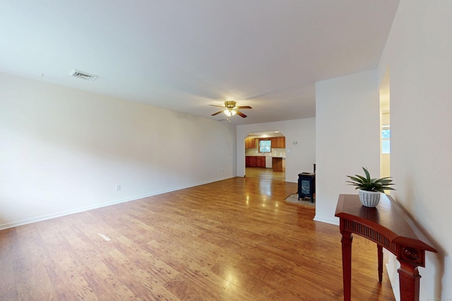 20 Hickory St, Danbury, CT 06810 - unfurnished living room with arched walkways, wood finished floors, and ceiling fan