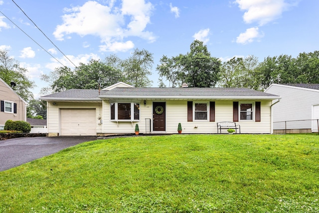 20 Hickory St, Danbury, CT 06810 - ranch-style home featuring asphalt driveway, an attached garage, and a front lawn
