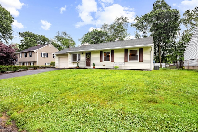 20 Hickory St, Danbury, CT 06810 - view of front of property with an attached garage and asphalt driveway