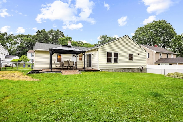 20 Hickory St, Danbury, CT 06810 - rear view of property featuring a gazebo, a patio area, a fenced backyard, and a chimney