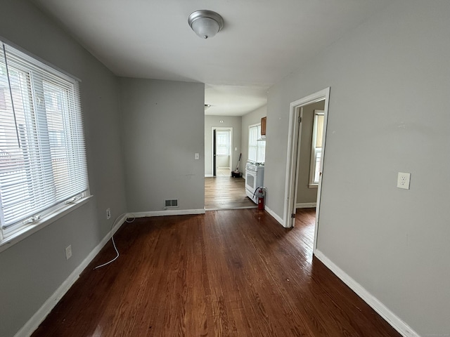 118 Cherry Ann St, New Haven, CT 06514 - spare room with dark wood-style flooring and baseboards