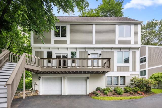 212 Richards Ave Apt 6, Norwalk, CT 06850 - view of front of home with asphalt driveway, a garage, and a shingled roof