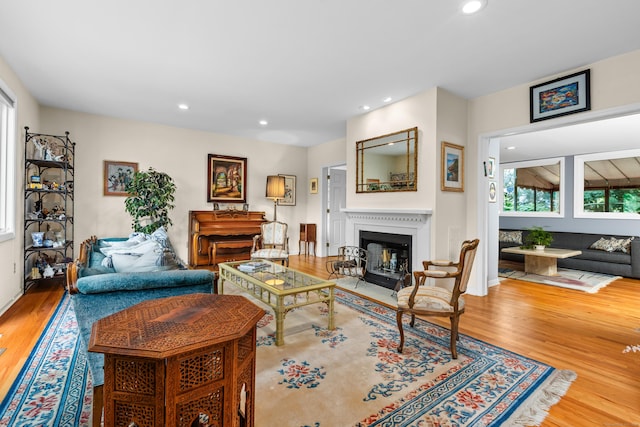 212 Richards Ave Apt 6, Norwalk, CT 06850 - living room featuring wood finished floors, a fireplace with flush hearth, and recessed lighting