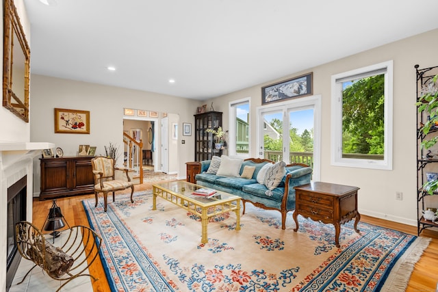 212 Richards Ave Apt 6, Norwalk, CT 06850 - living room with light wood finished floors, a fireplace with flush hearth, and recessed lighting