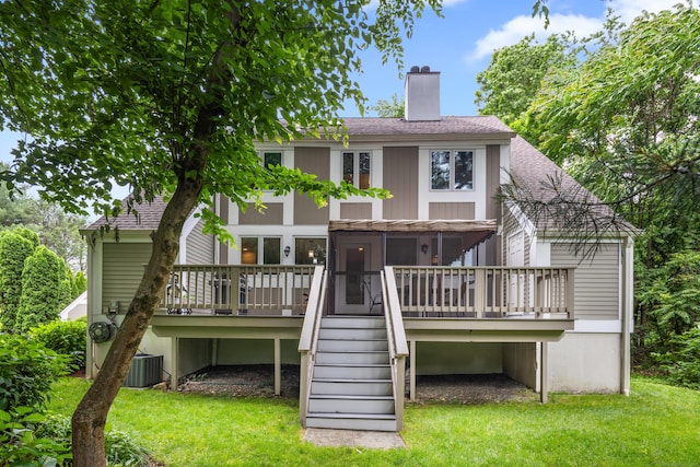 212 Richards Ave Apt 6, Norwalk, CT 06850 - rear view of property featuring stairs, a chimney, a lawn, and roof with shingles