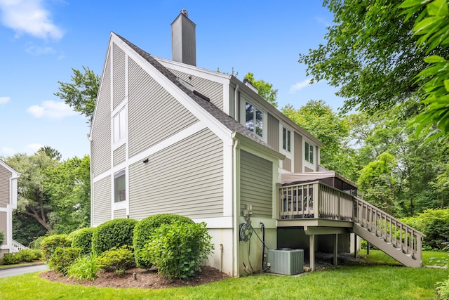 212 Richards Ave Apt 6, Norwalk, CT 06850 - view of property exterior with stairway, a wooden deck, a chimney, a yard, and roof with shingles