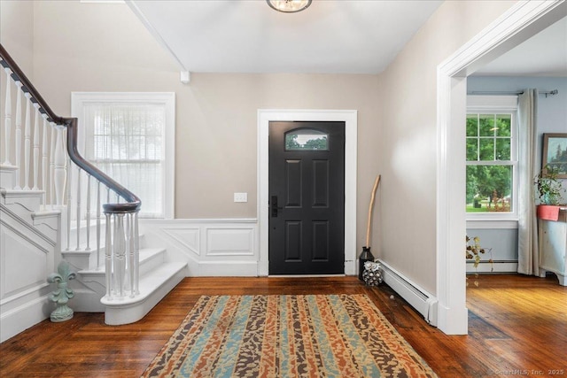 20 Channing St, New London, CT 06320 - entryway featuring baseboard heating, stairs, and wood finished floors