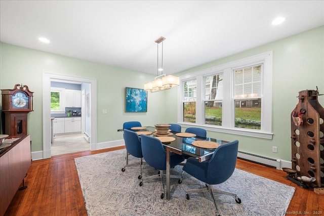 20 Channing St, New London, CT 06320 - dining space with a baseboard radiator, wood finished floors, and recessed lighting