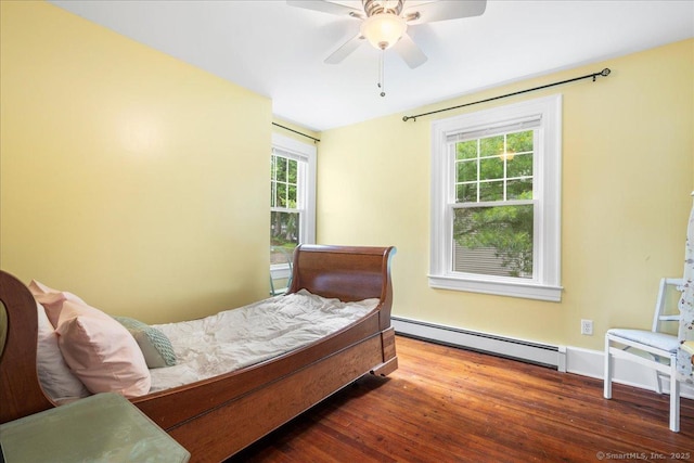 20 Channing St, New London, CT 06320 - bedroom with baseboard heating, wood finished floors, and ceiling fan