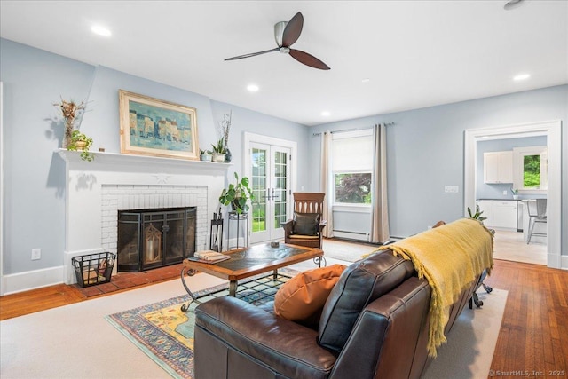 20 Channing St, New London, CT 06320 - living area with ceiling fan, healthy amount of natural light, wood finished floors, and recessed lighting