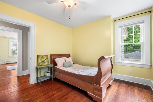 20 Channing St, New London, CT 06320 - bedroom featuring hardwood / wood-style floors, multiple windows, and baseboard heating