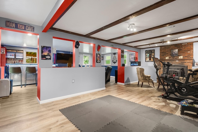 205 Luther Dr, Southbury, CT 06488 - exercise room with wood finished floors and a community bar