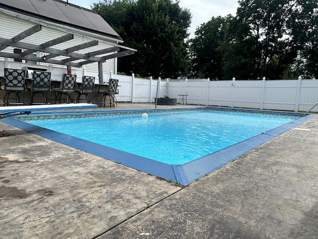 27 Woodbridge Ave, East Hartford, CT 06108 - view of swimming pool featuring a fenced backyard and a patio area