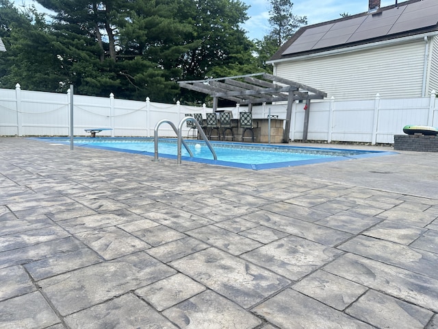 27 Woodbridge Ave, East Hartford, CT 06108 - view of swimming pool with a pergola and a patio