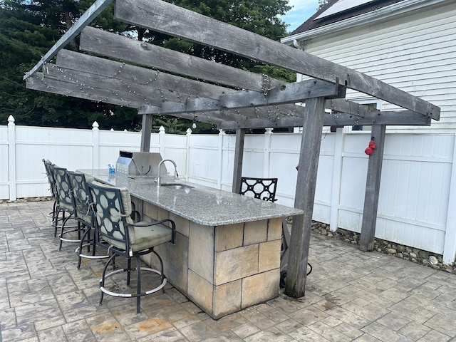 27 Woodbridge Ave, East Hartford, CT 06108 - view of patio with a pergola and area for grilling