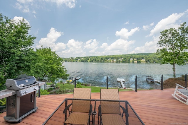 100 N Lake Shore Dr, Brookfield, CT 06804 - wooden terrace with grilling area, a water view, and a boat dock