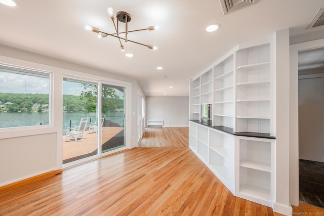 100 N Lake Shore Dr, Brookfield, CT 06804 - interior space with light wood-type flooring, a chandelier, recessed lighting, and built in features