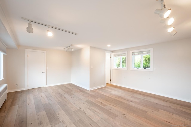 100 N Lake Shore Dr, Brookfield, CT 06804 - spare room with rail lighting and light wood finished floors
