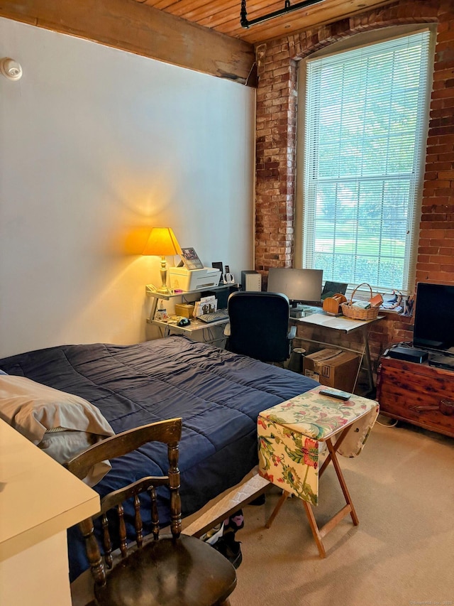 92 Main St Apt 102, Deep River, CT 06417 - bedroom with carpet, brick wall, and beamed ceiling