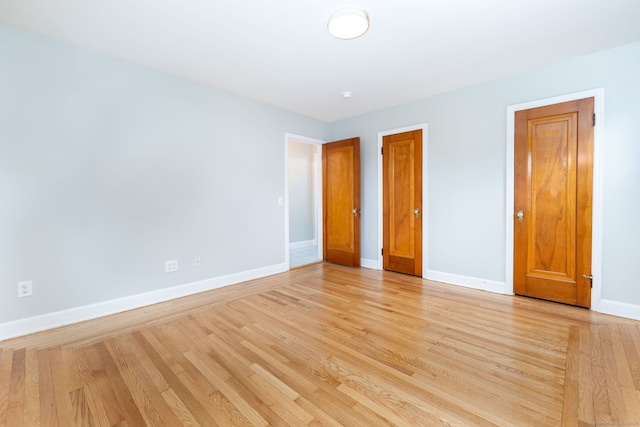 19 Robert St, Hamden, CT 06514 - unfurnished bedroom with light wood-type flooring
