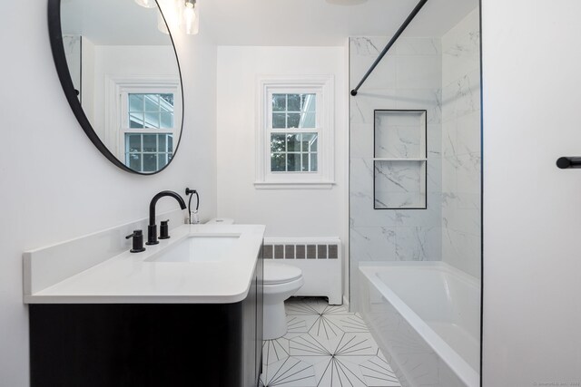 19 Robert St, Hamden, CT 06514 - full bath featuring radiator heating unit, vanity, healthy amount of natural light, and  shower combination