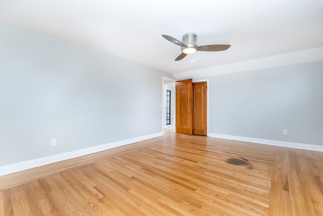 19 Robert St, Hamden, CT 06514 - empty room with a ceiling fan and light wood-style floors