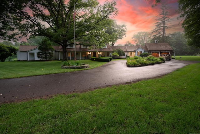 509 Main St N, Woodbury, CT 06798 - view of property's community featuring asphalt driveway and a lawn