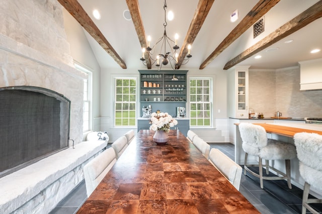 509 Main St N, Woodbury, CT 06798 - dining area featuring a chandelier, beam ceiling, recessed lighting, a high end fireplace, and tile patterned flooring